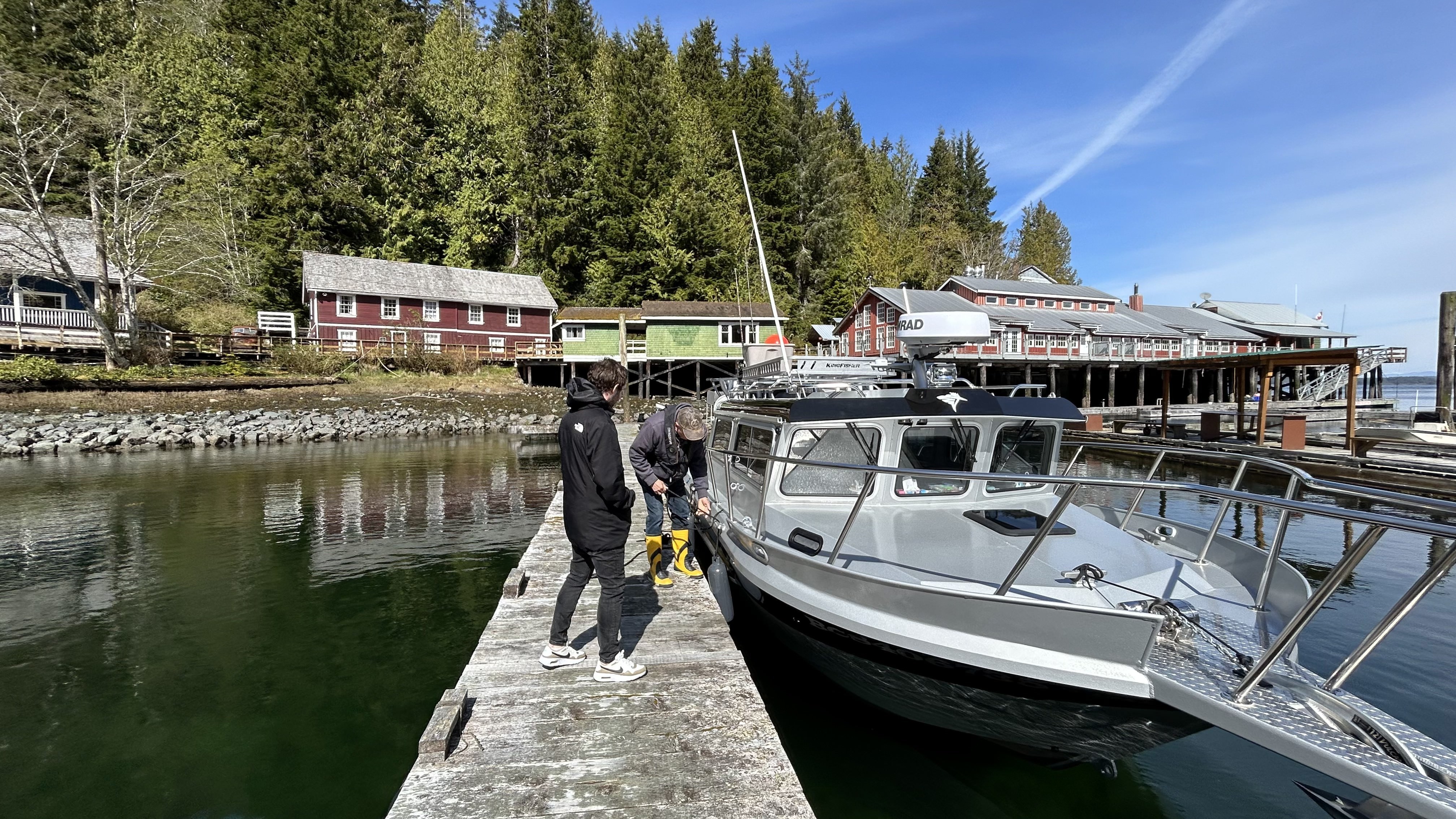 CA British Columbia Vancouver Island Telegraph Cove houses and boat