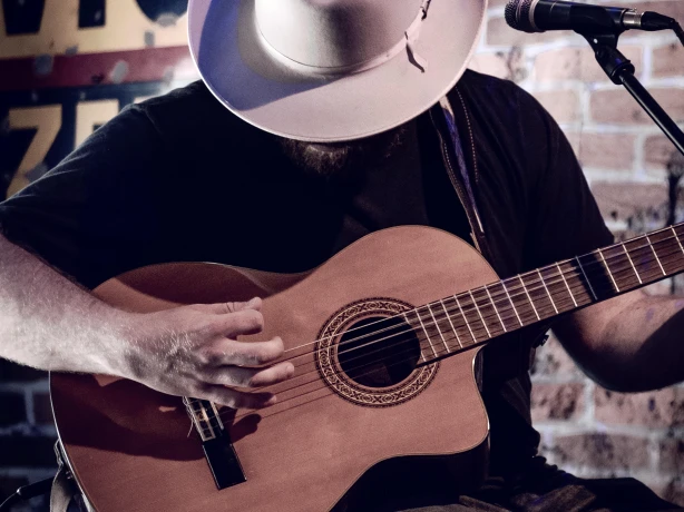 USA Tennessee Nashville man with guitar tim mossholder unsplash